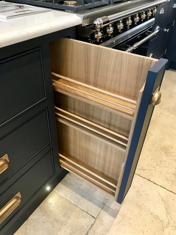 A vertical pull-out spice rack